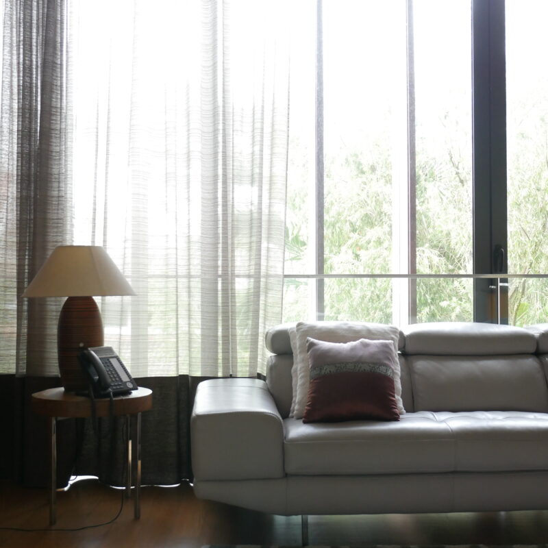 clean sofa in living room, sofa cleaning singapore